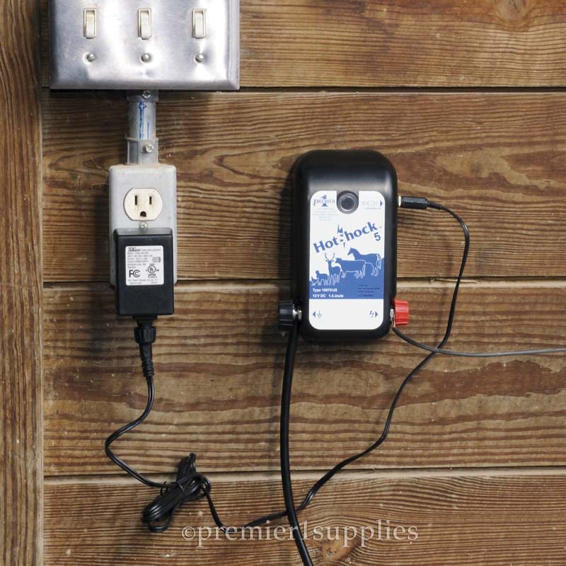Premier 1 HotShock 5 Fence Energizer, Plug-in Kit, 0.5 Joule | Kit includes 100' insulated wire & ground rod. Plug-in, 110V. Low impedance. For temporary & semi-permanent fences.